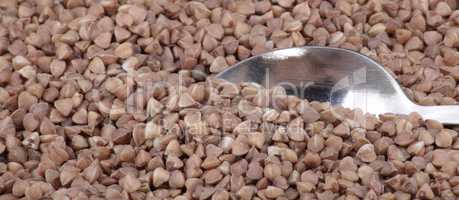 buckwheat background and teaspoon