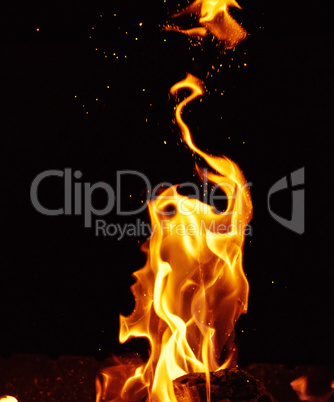 bright orange and yellow flames with sparks