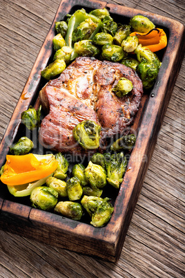 Beef steaks with grilled vegetables