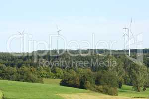 Forest with wind turbines