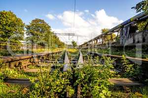 old closed overgrown railway