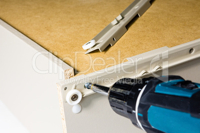 Attaching the slider to the drawer