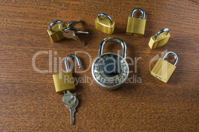 Digital access padlock and six small locks with keys and no keys