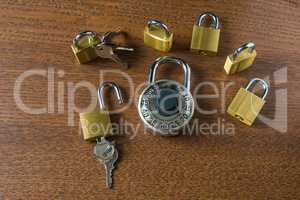 Digital access padlock and six small locks with keys and no keys