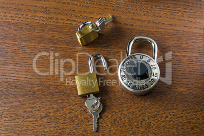 Digital access padlock and two small locks with keys