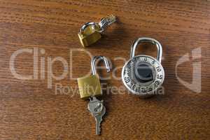 Digital access padlock and two small locks with keys