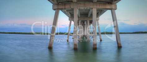 Under the bridge of New Pass from Estero Bay Sunset