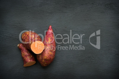 Fresh organic sweet potato copy space