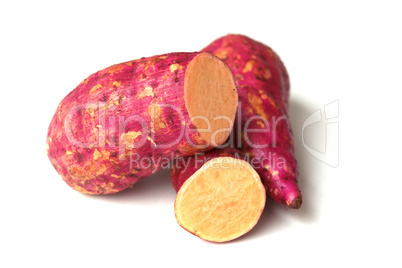 Raw sweet potato on white