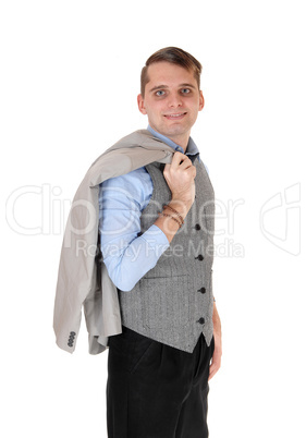 Young man standing whit his jacket over shoulder