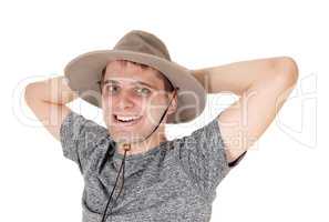Happy young man with a beige hat
