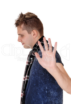 Man holding a hand up saying no