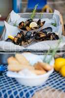 Roasted mussels on a baking pan