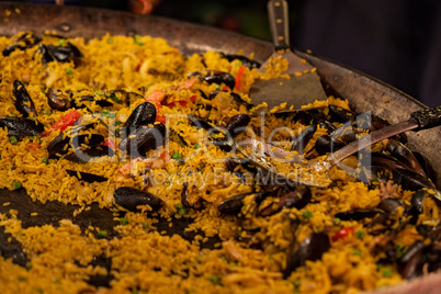 Typical spanish seafood paella in pan