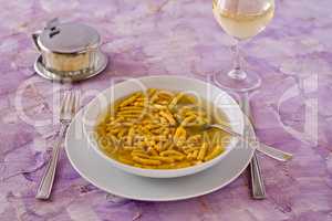 Passatelli in broth original Italian pasta