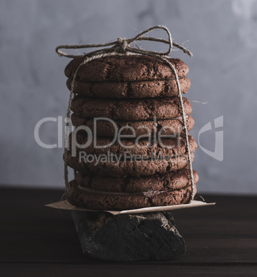 stack of round chocolate cookies tied with a rope