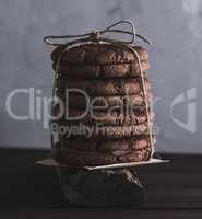 stack of round chocolate cookies tied with a rope