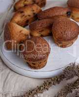 small round baked cupcakes with dry fruits and raisins