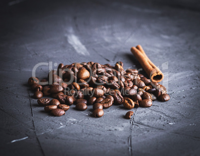 pile of brown roasted coffee beans