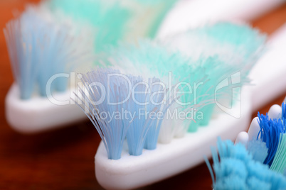 xtreme Macro close up of toothbrush with wooden background