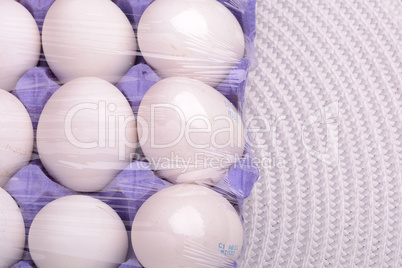 Raw chicken eggs set on white background