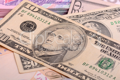 US Dollars background with focus on Alexander Hamilton