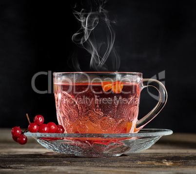 hot viburnum tea in a transparent cup
