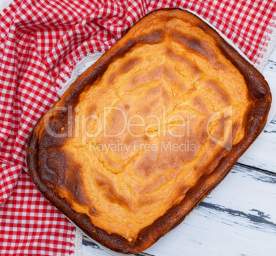 whole rectangular pie of cottage cheese and pumpkin