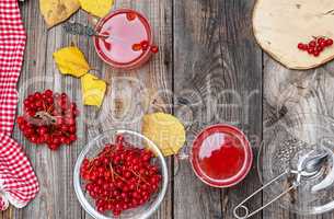 tea from fresh berries of viburnum in a transparent glass cup