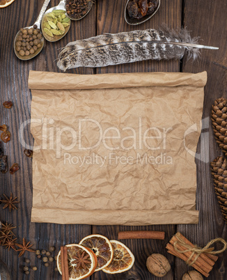 empty rolled brown paper sheet on a wooden background