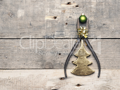 Old pliers with Christmas bauble