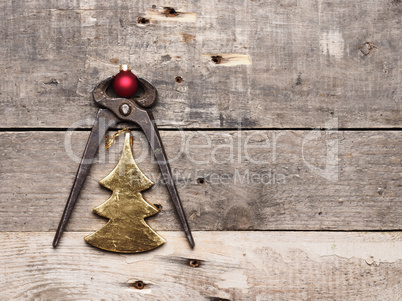Old pliers with Christmas bauble