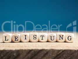 German word effort on wooden dices