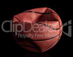 Deflated old basketball