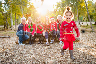 Christmas Themed Multiethnic Family Portrait Outdoors