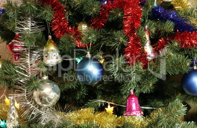 many of toys on green christmas fir