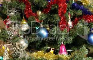 many of toys on green christmas fir