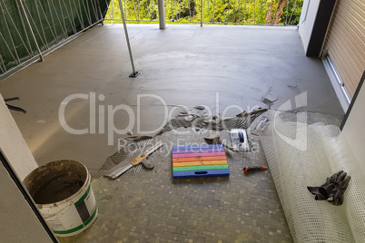 Balcony floor tiles installation