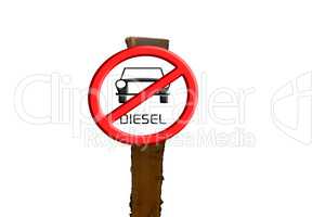 Sign Diesel cars prohibited against blue sky and sun.