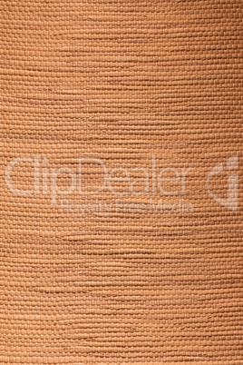 Tan textured bamboo fabric background