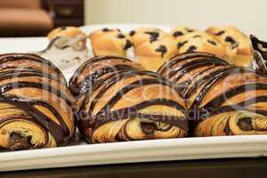 Flakey Chocolate Croissant grouped on a plate in a bakery fresh