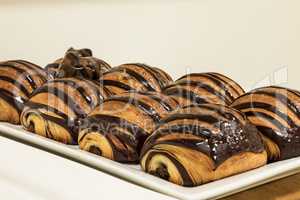 Flakey Chocolate Croissant grouped on a plate in a bakery fresh