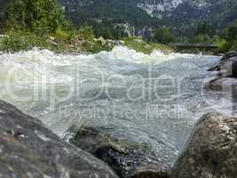 Rough mountain river in the Swiss Alps, Grindelwald, Europe.