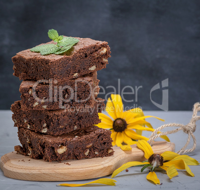 stack of square pieces of chocolate brownie cake