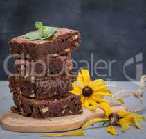 stack of square pieces of chocolate brownie cake