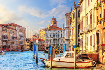Grand Canal in Venice with its traditional palaces, piers and bo