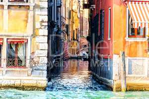 Venice street canal with a small bridge near Piazza San Marco