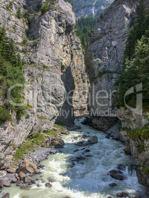 Rough mountain river in the Swiss Alps, Grindelwald, Switzerland