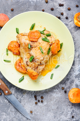 Chicken meat in apricot sauce