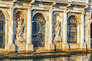 Statues on the facade of Giusti Palace on the Grand Canal of Ven
